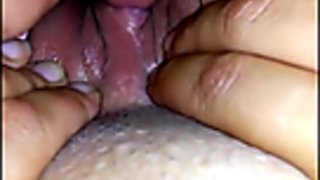 Teasing her huge clit with his cock
