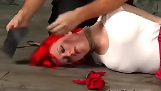 Red haired slut is tied up and punished by horny master